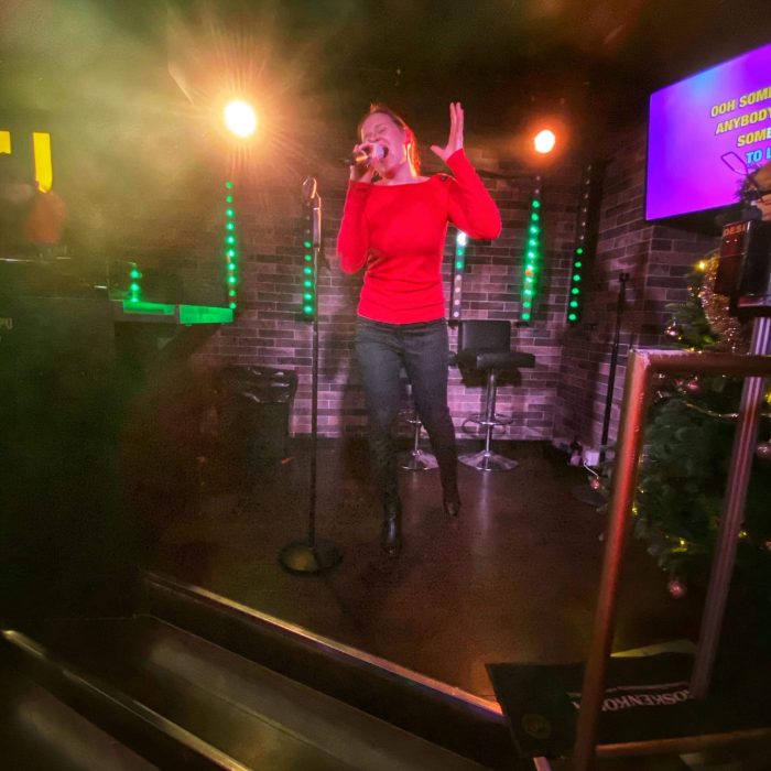 Singing karaoke
